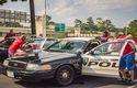 Former inmates clean cars to thank the police