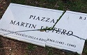 Plaque of the Martin Luther square in Rome shattered