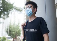 Hong Kong Christian activist sentenced to 13 months in prison