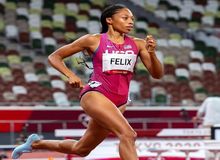 Allyson Felix beats Carl Lewis record “by the grace of God”