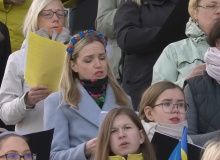 A woman cleans and cries in Ukraine