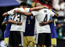Curaçao and Germany players pray together after World Cup match