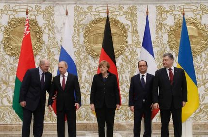 Leaders pose during talks at the presidential residence in Minsk. / AFP