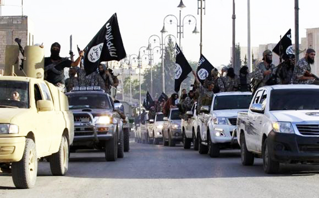 Militant Islamist fighters of ISIS in Raqqa, last year. / Reuters.,yihadists Raqqa