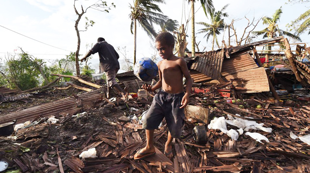 A kid plays in Vanuatu. / Reuters,Vanuatu
