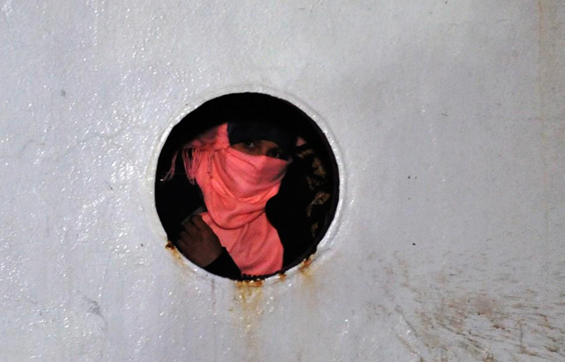 A refugee in a ship after being rescued. / AP,mediterranean photo, migrants