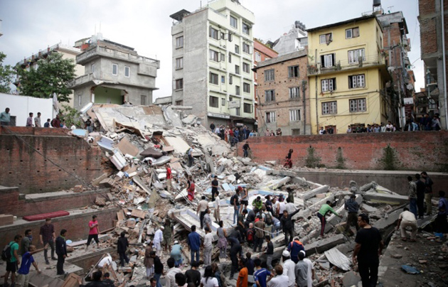 People search for survivors stuck under the rubble of a destroyed building in Kathmandu- / EPA,Kathmandu
