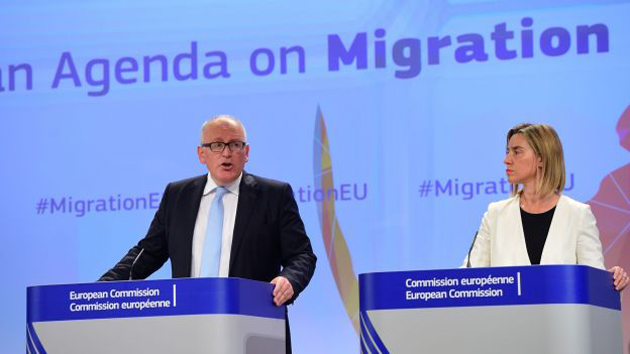 Frans Timmermans and Federica Mogherini announcing the new EU plan. / Getty,