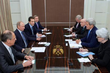 John Kerry met Putin in Russia. / AP
