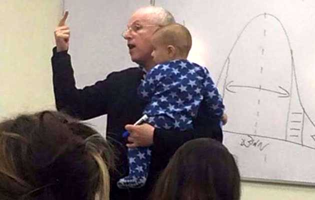 Hebrew University Professor Sydney Engelberg holding a student’s baby while lecturing,Sydney Engelberg