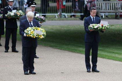 David Cameron and Boris Johnson at the memorial service in Hyde Park. / EPA