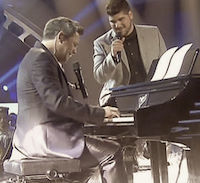 Singing with  Alejandro Sanz.