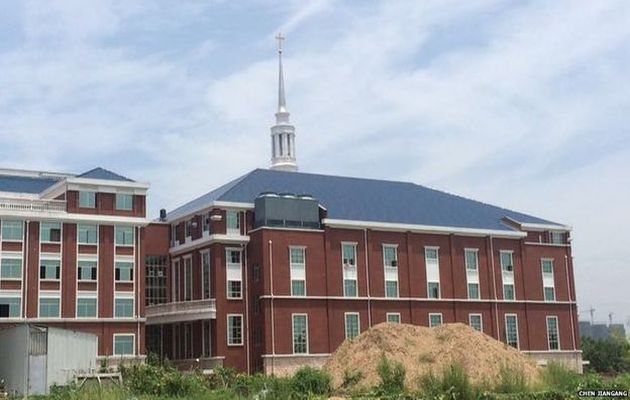 The Holy Love Christian Church had refused to remove the cross on their building ,