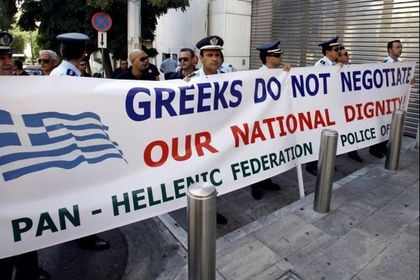 Greeks protesting against Euopean aid / Reuters