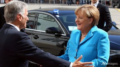 Angela Merkel arriving at the Summit / AFP
