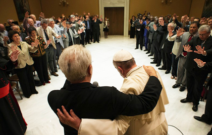 Some evangelical leaders pray with Pope Francis in May 2015.