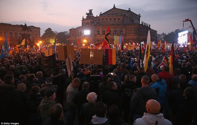 At least 15,000 marched through Dresden for Pegida anniversary / Getty ,