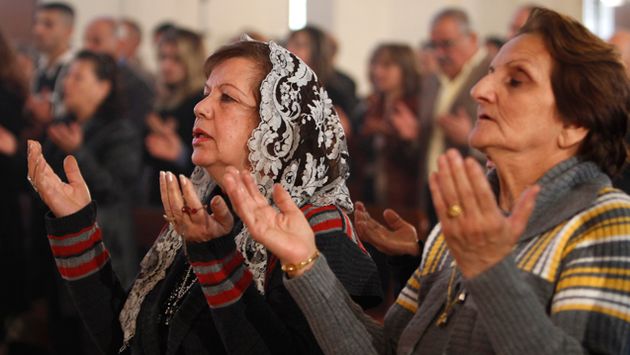 Christian women in Iraq / Reuters,