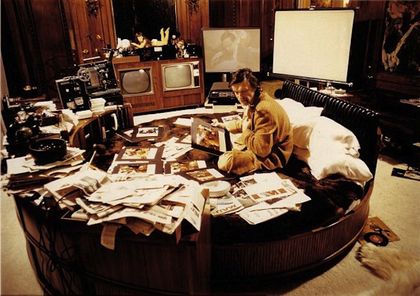 The bed Hefner used as an office in his Chicago mansion.