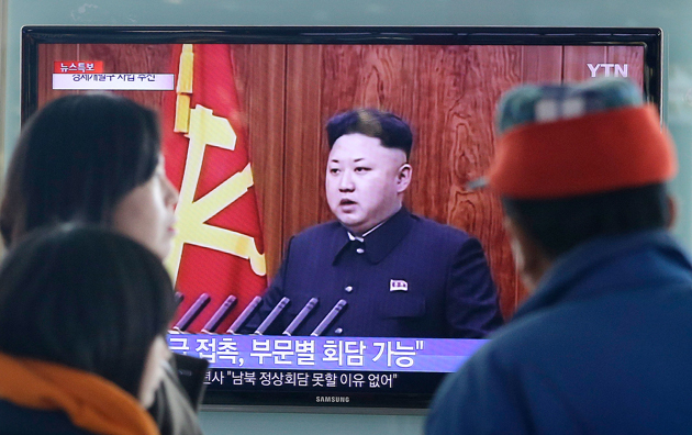 Pedestrians in Seoul, South Korea watch a news program showing North Korean leader Kim Jong Un. / AP,kim jong un,  north korea, kim jong un