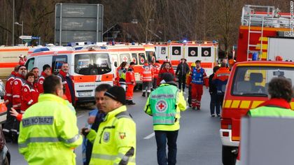 Hundreds of fire fighters, emergency services workers and police officers at the crash scene /AP