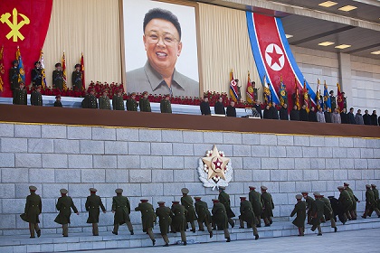 Senior military members approach an area where new North Korean leader Kim Jong Un and other military and political leaders stand, 16 February 2012. / David Guttenfelder.