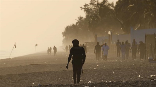 A security officer walks on the beach after an attack in Grand Bassam, Ivory Coast. / AlJazeera,grand bassam 