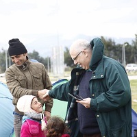 Ian Caralee leads the team of Christians helping from Albania at Idomeni. / OAC Albania