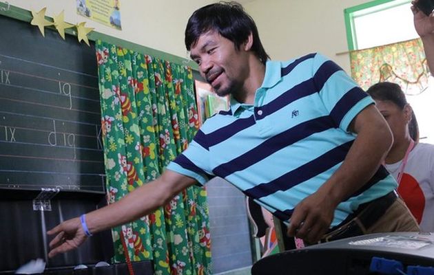 Pacquiao cast his vote on Monday in his home turf of southern Sarangani province. /EPA,