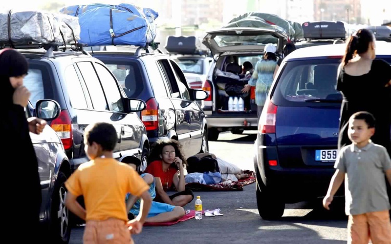 People waiting to cross to Africa in a Mediterranean port.