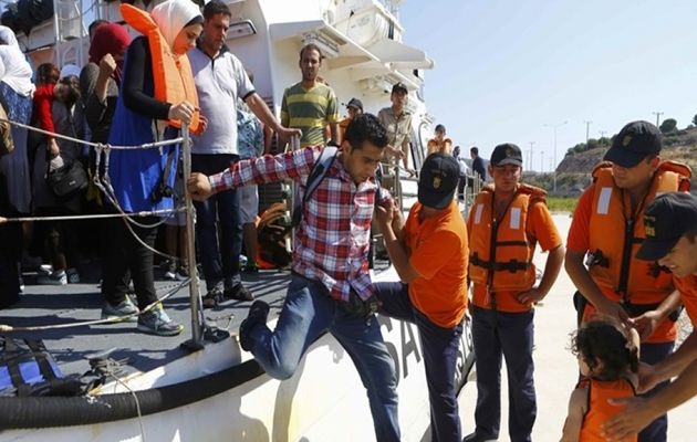 Some 156,567 men, women and children arrived in Greece through 31 May. ,