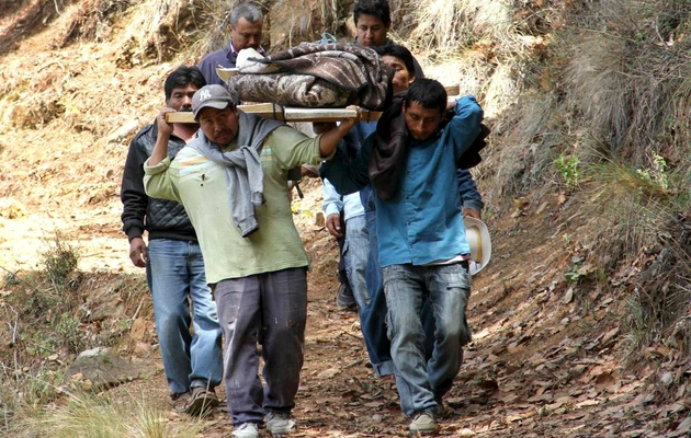 Family members carried the bodies,