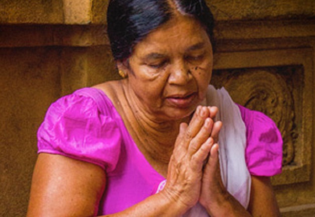 India, woman praying, christians