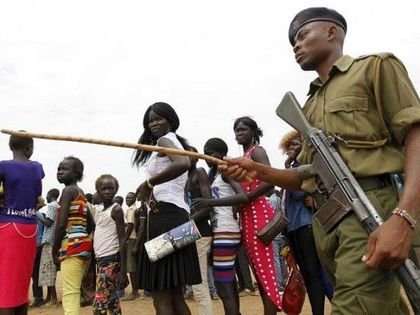 South Sudanese armed forces at the entrance of a church/ Reuters