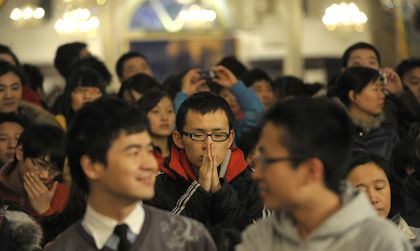 Young Chinese attend church services regularly