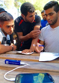 Syrian refugees at a refugee camp in Athens. / TWR