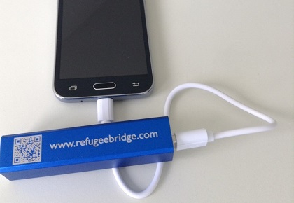 A power bank with the QR code to the app website. / TWR