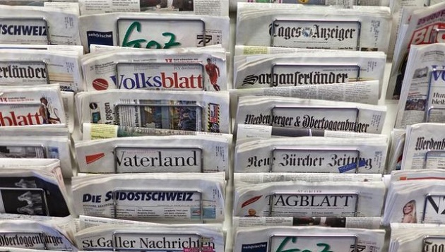 Newspaper in a Swiss news-stand. ,
