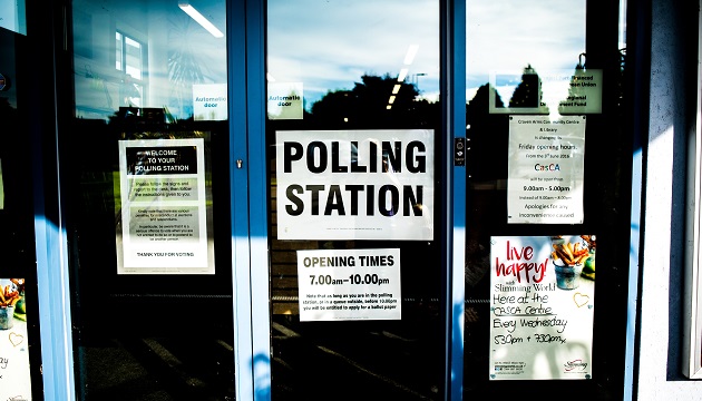 A polling station in the UK. / Elliot Stallion (Unsplash, CC),voters, polling station