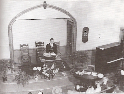 Schaeffer preaching in a church in Grove City.