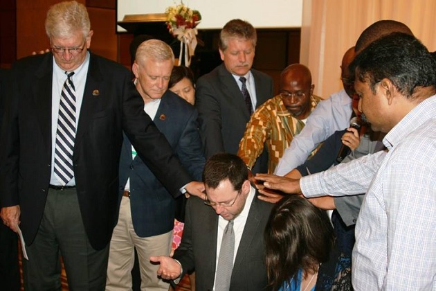 Baptist leaders pray for Elijah Brown after he is elected as new secretary general of the BWA. / BWA,