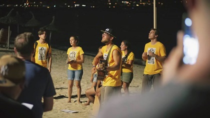 Singing on the beach. / Gospel Tribe FB