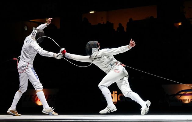 Fencing match. / Wikimedia commons,