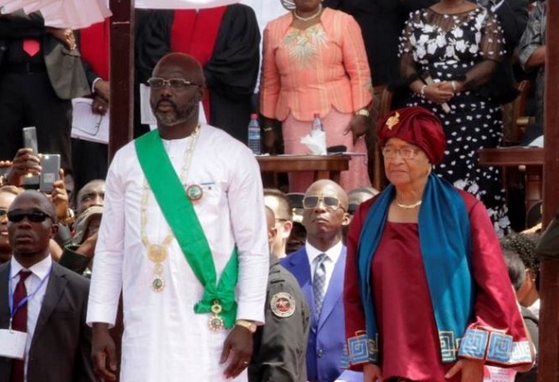 President George Weah standing next to his predecessor, Ellen Johnson Sirleaf. / Twitter,