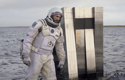 An astronaut with the robot ‘TARS’ from Interstellar (2014).