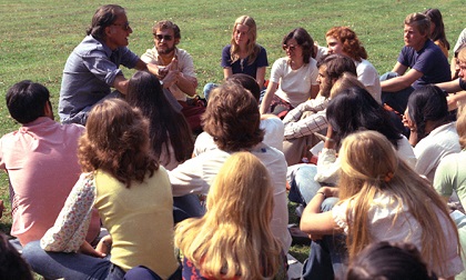 Answering questions from a group of young people at Eurofest, Brussels, Belgium, in 1975. / BGEA