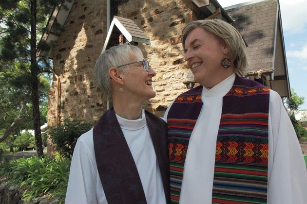 Transgender priest Jo Inkpin (right) and wife Penny Jones, also a priest. / ABC Australia, Geoff Kemp.,