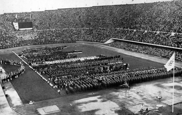 Japan and Germany were in the opening ceremony of the Helsinki Olympic Games in  1952. / Wikimedia Commons.,