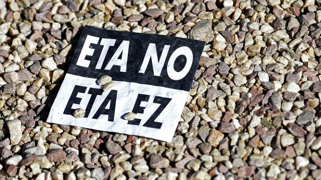 The signs against ETA, in Spanish and Basque language, were used in hundreds of demonstrations against violence. / AFP,