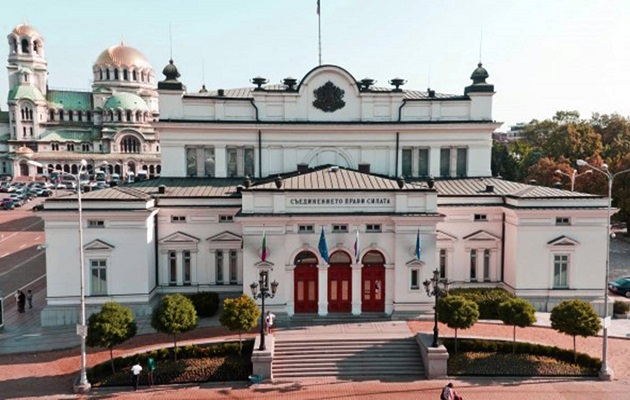 The Bulgarian Parliament in Sophia, with the Eastern Orthodox cathedral Alexander Nevski in the background. / CC0, public domain,